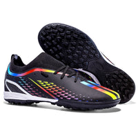 Black soccer cleats with colorful accents on a white background